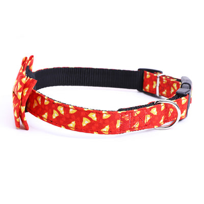 A Large Dog Bow On A Christmas Pet Collar