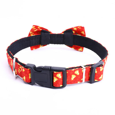 A Large Dog Bow On A Christmas Pet Collar