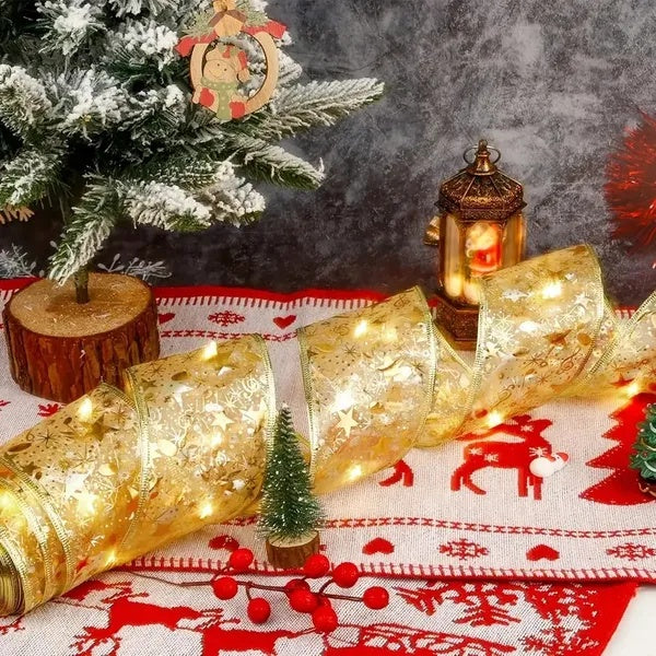 A Christmas Tree With 32 Feet Of Ribbon